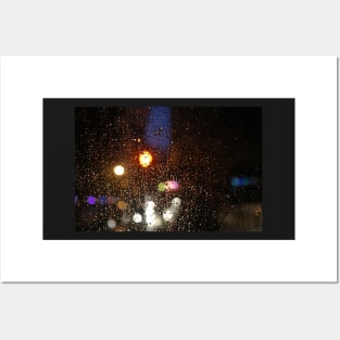 Deatil of raindrops on a car windshield at night Posters and Art